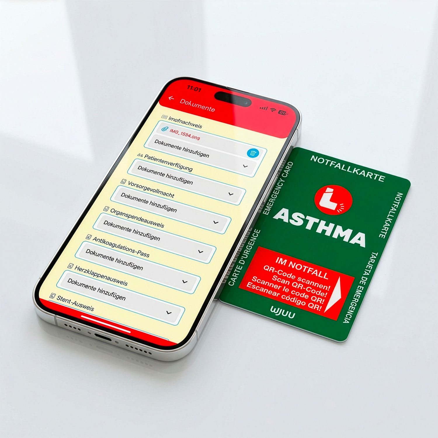 Wjuu Notfallkarte für Asthmatiker neben Smartphone mit digitalem Profil und Dokumenten